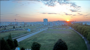 Sonnenaufgang über dem Flugfeld und dem Baufeld des neuen Klinikums